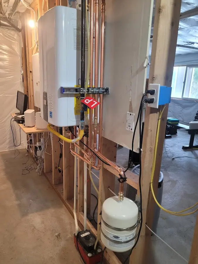 Licensed plumber repairing a kitchen sink in Upper Leacock